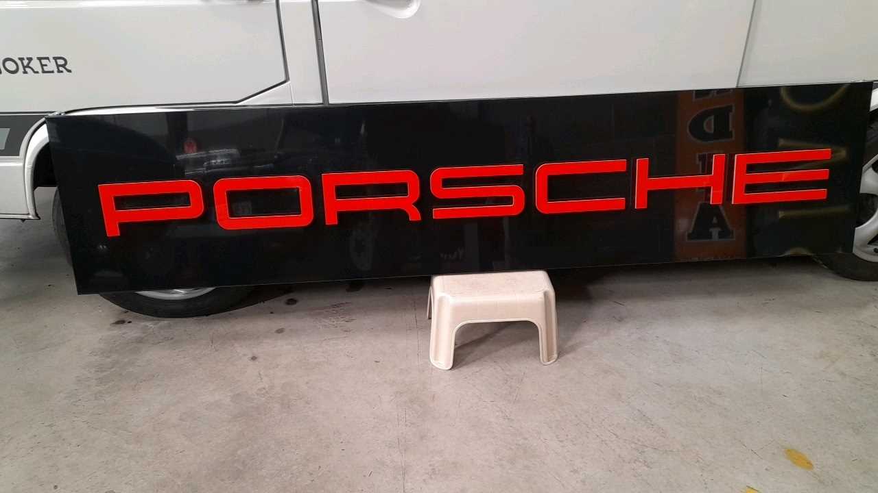 Lot 283 - PORSCHE SIGN BLACK & RED LETTERS