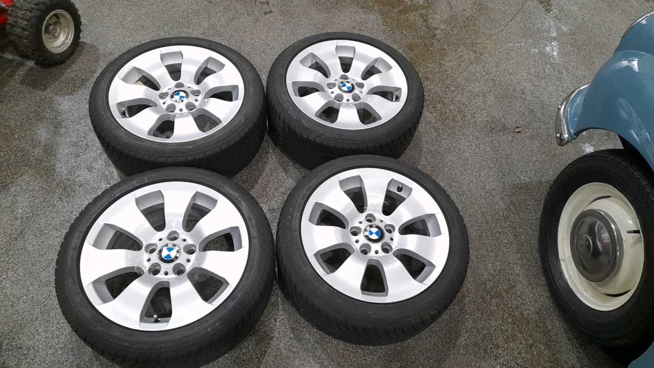 Lot 395 - BMW ALLOY WHEELS WITH WINTER TYRES  GOOD YEAR 225/45 R 17