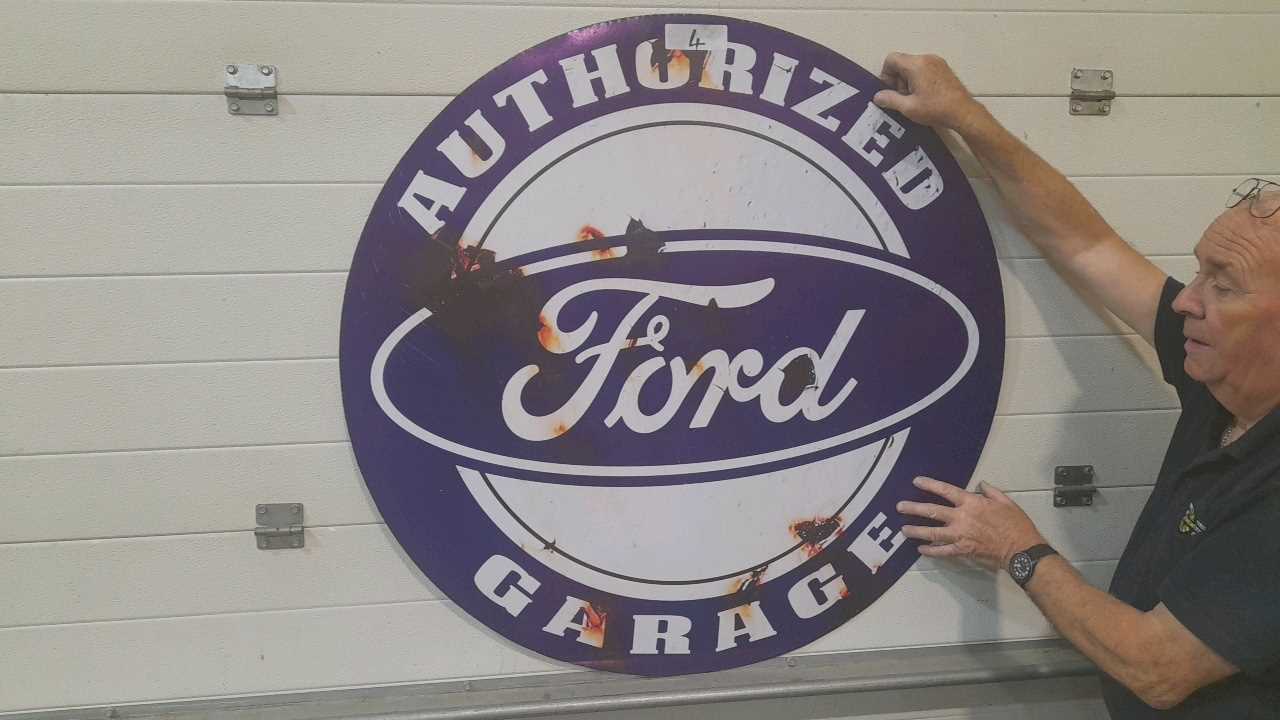Lot 29 - ROUND AUTHORIZED FORD GARAGE METAL REPRO SIGN 38"