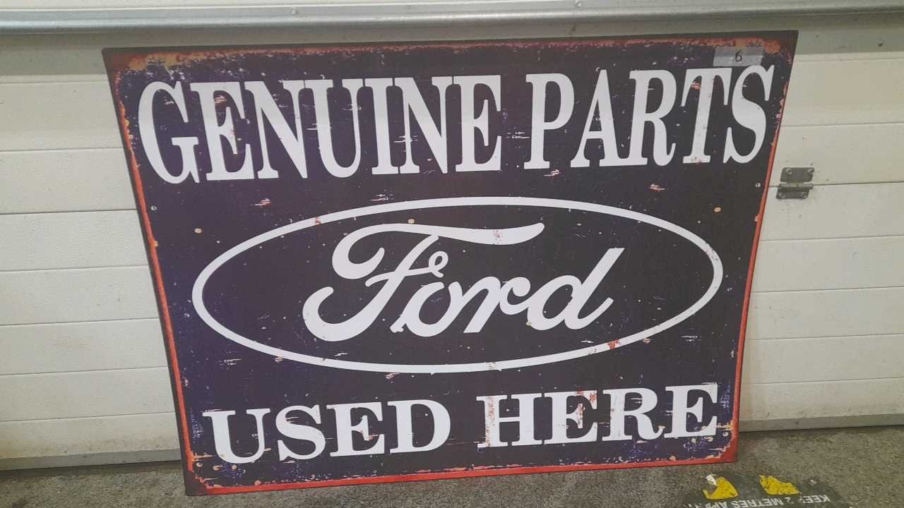 Lot 41 - LARGE GENUINE FORD PARTS USED HERE METAL REPRO SIGN  49" X 38"