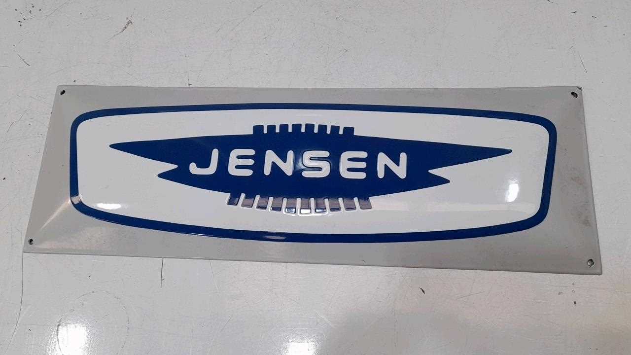 Lot 659 - JENSEN SIGN 24" X 8"