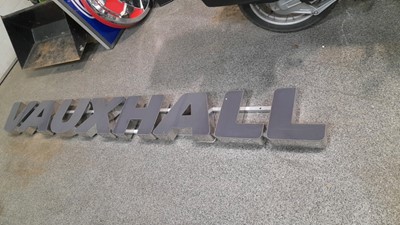 Lot 411 - GREY/ CHROME  LONG VAUXHALL DEALER SIGN  120" X 13"