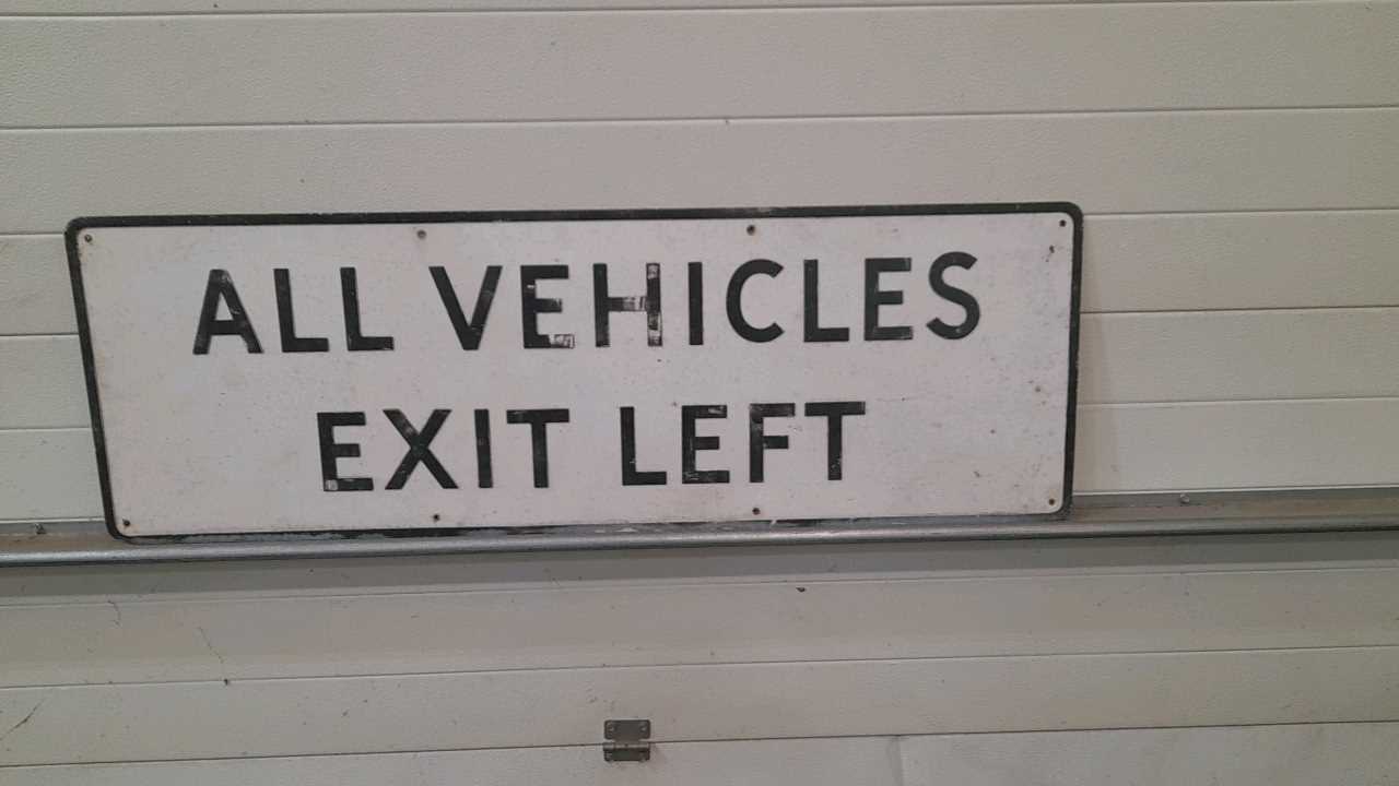 Vehicles Cannot Exit Sign Lot 668 - ALL VEHICLES EXIT LEFT SIGN