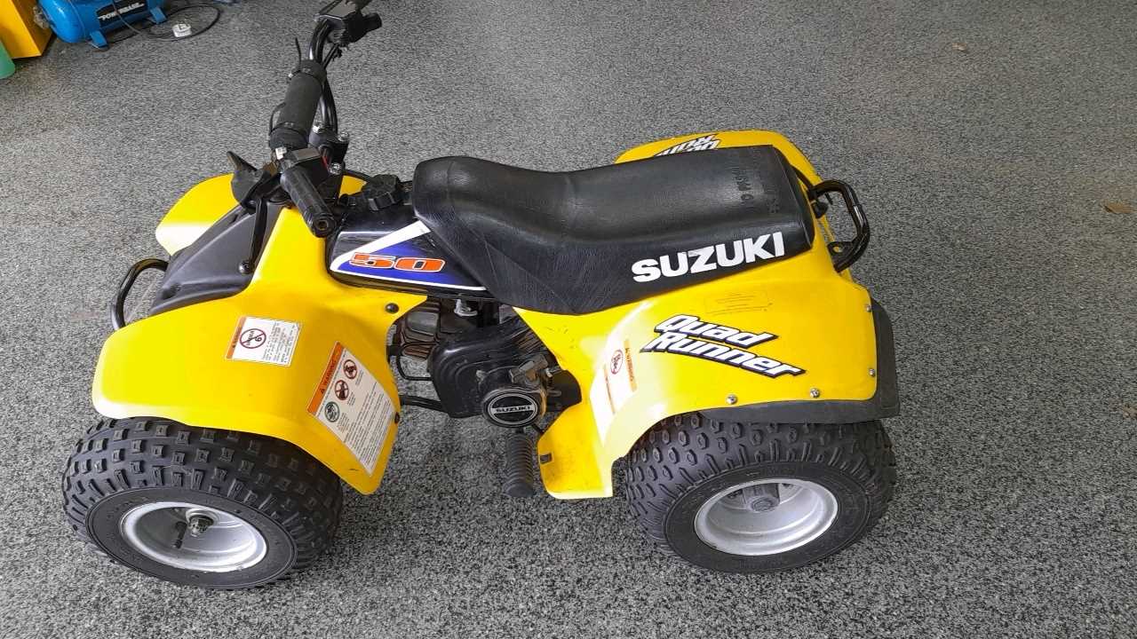 Lot 614 - SUZUKI YELLOW CHILDS 50CC QUAD