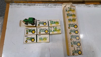 Eight john deere miniature toy sales tractors