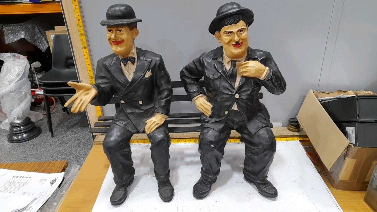 Lot 154 - LAUREL & HARDY FIGURES SAT ON A BENCH