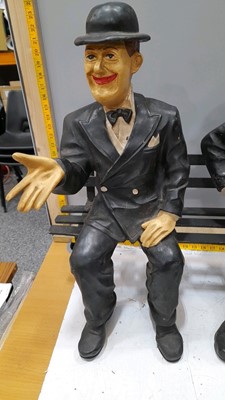 Lot 154 - LAUREL & HARDY FIGURES SAT ON A BENCH