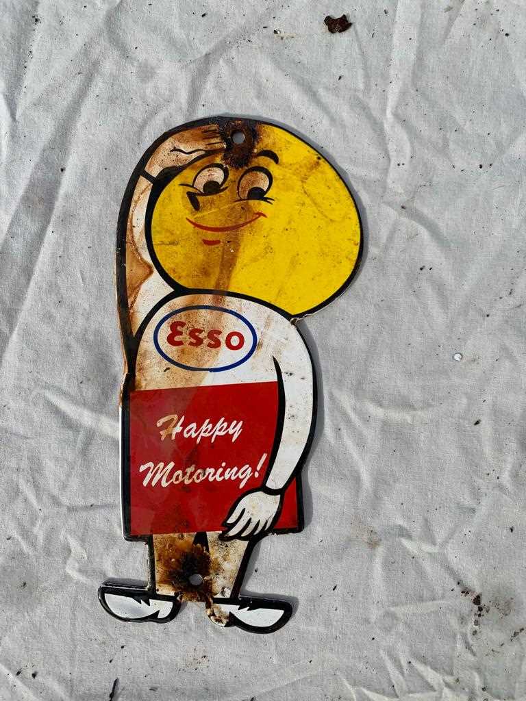 Lot 324 - ESSO HAPPY MOTORING FIGURE ENAMEL SIGN 8" X 4"