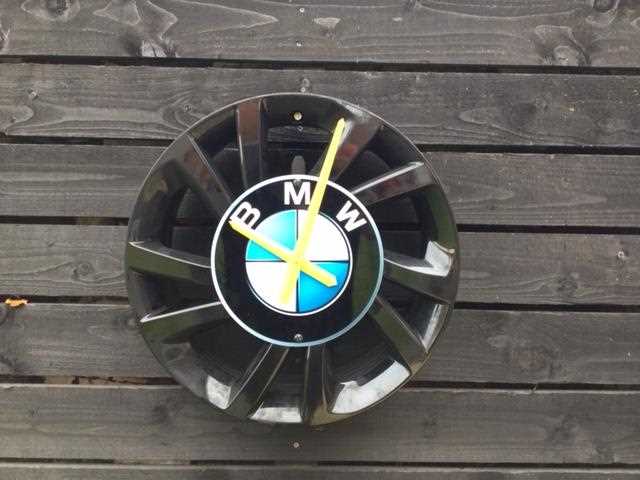 Lot 257 - BMW ALLOY WHEEL CLOCK