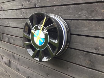 Lot 257 - BMW ALLOY WHEEL CLOCK