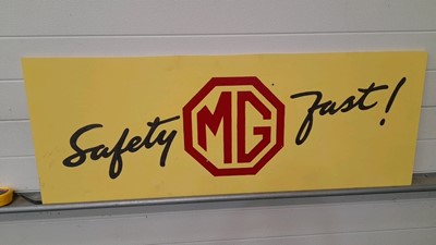 Lot 298 - HAND PAINTED WOODEN M.G SAFETY FAST SIGN 48" X 18"