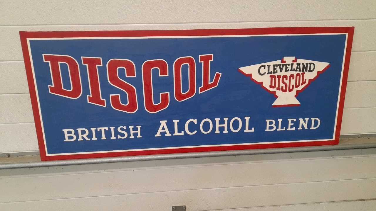 Lot 287 - HAND PAINTED WOODEN DISCOL SIGN 48" X 19"