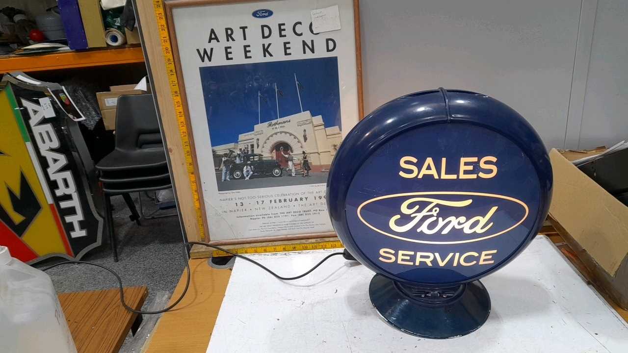 Lot 271 - FORD ART DECO WEEKEND FRAMED POSTER & FORD SALES & SERVICE PLASTIC LIGHT UP GLOBE