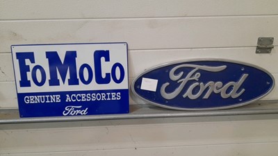 Lot 272 - FOMOCO ACCESSORIES TIN  & FORD CAST REPRO SIGNS  17"X12" & 24"X9"