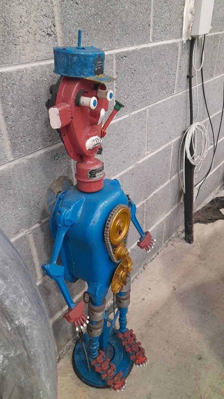 Lot 584 - ENGINE PARTS STATUE