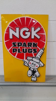 Lot 594 - NGK SPARK PLUG PLASTIC SIGN 16" X 11"