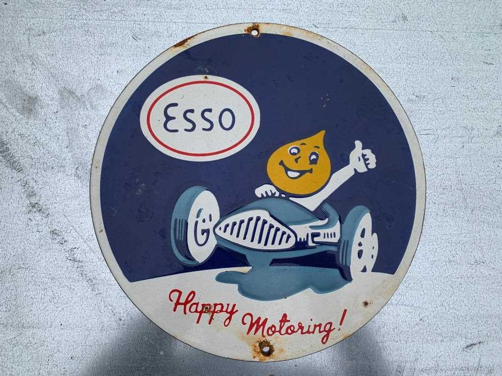 Lot 133 - ESSO RACING CAR ENAMEL SIGN  11" DIA