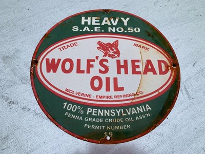 Lot 183 - WOLF'S HEAD OIL ENAMEL SIGN  12" DIA