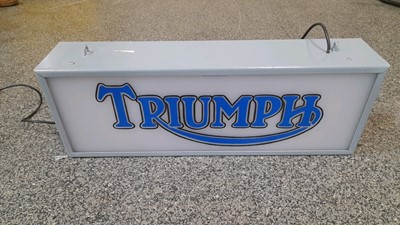 Lot 100 - TRIUMPH  DOUBLE SIDED LIGHT-UP SIGN  25" X 9"