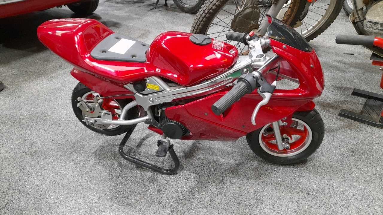 Lot 316 - MINI CHILDS PETROL RACING MOTORCYCLE