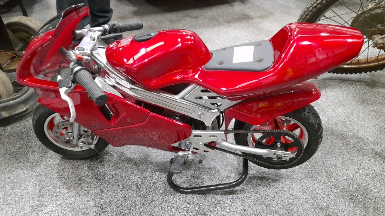 Petrol Mini Rocker Lot 316 - MINI CHILDS PETROL RACING MOTORCYCLE