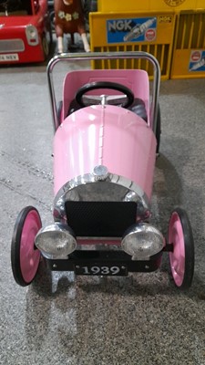 Lot 439 - PINK VINTAGE PEDAL CAR  ( EX SHOP DISPLAY AS NEW )