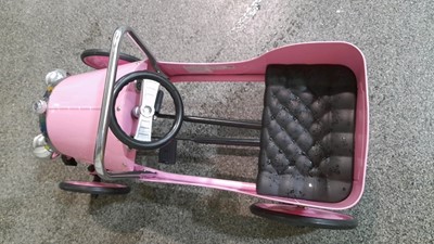 Lot 439 - PINK VINTAGE PEDAL CAR  ( EX SHOP DISPLAY AS NEW )