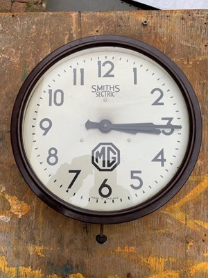 Lot 409 - MG CAR WALL CLOCK 12"