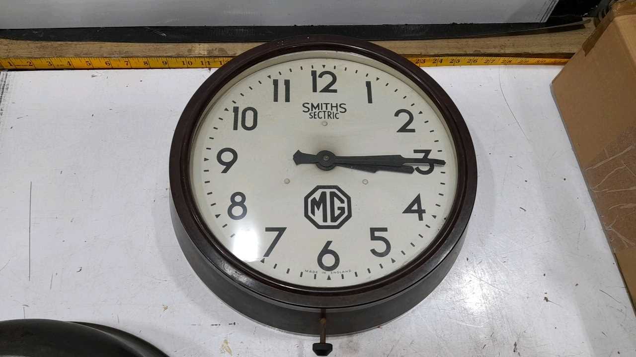Lot 409 - MG CAR WALL CLOCK 12