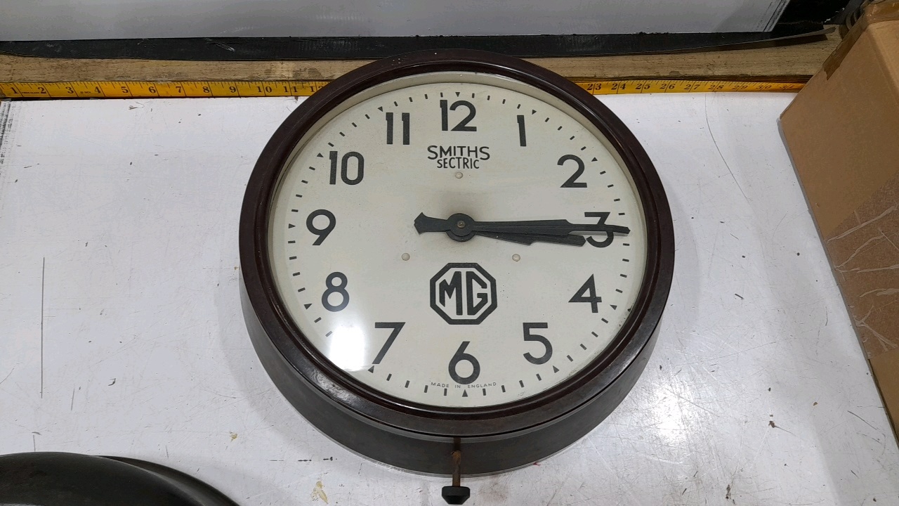 Lot 409 - MG CAR WALL CLOCK 12