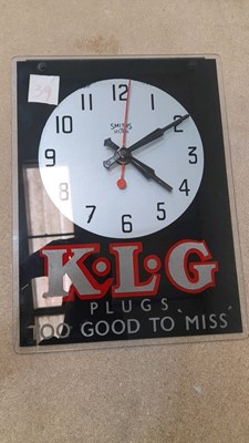 Lot 423 - KLG PLUGS WALL CLOCK