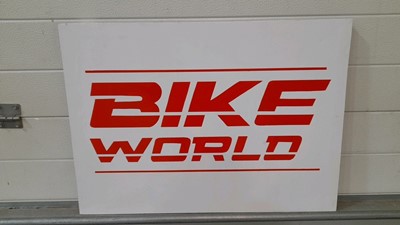 Lot 106 - HAND PAINTED BIKE-WORLD SIGN ON CANVAS 27" X 19"