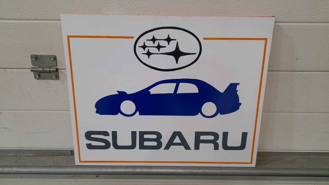 Lot 396 - HAND PAINTED SUBARU SIGN ON CANVAS 16" X 20"