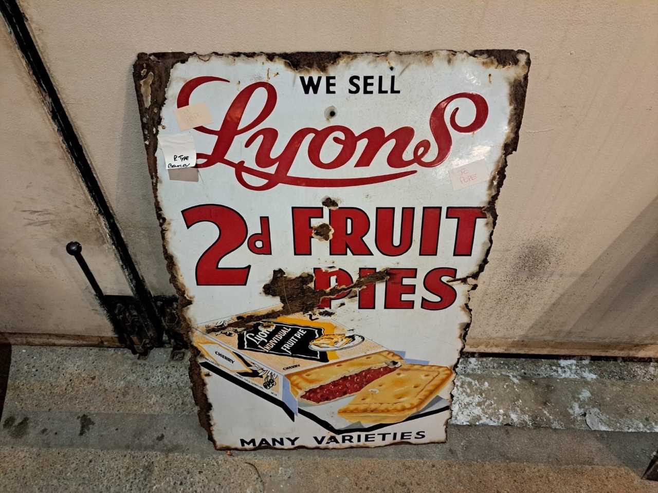 Lot 521 - LYONS FRUIT PIES ENAMEL SIGN 22" X 34"