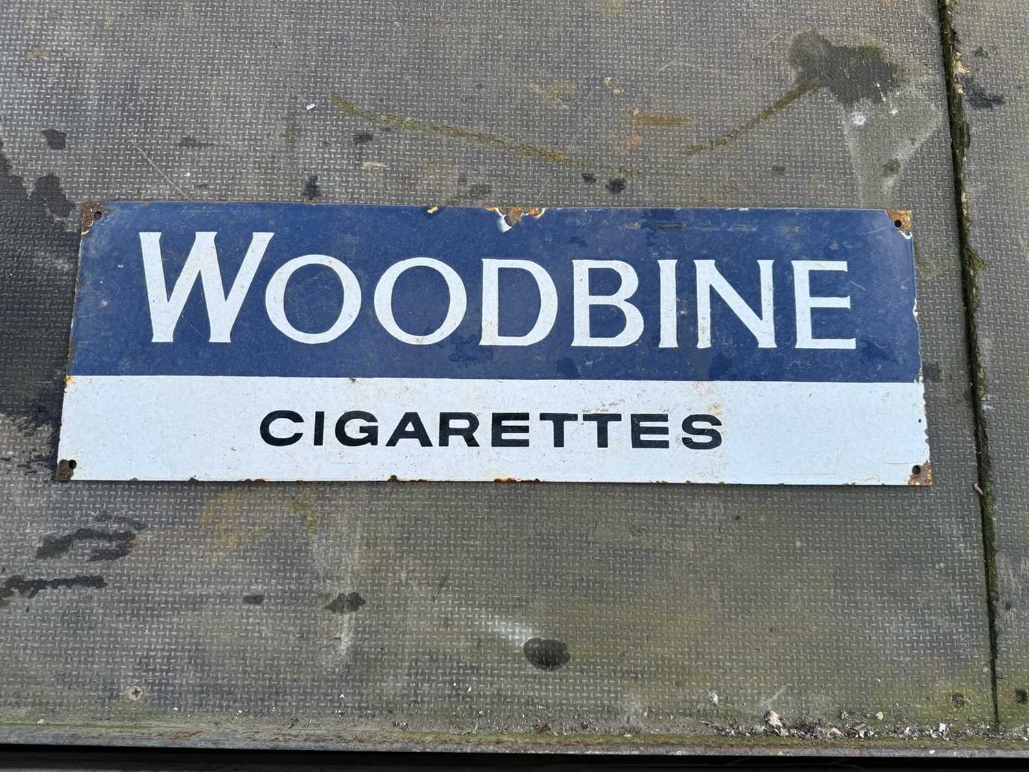 Lot 140 - WOODBINE CIGARETTES ENAMEL SIGN  24" X 8"