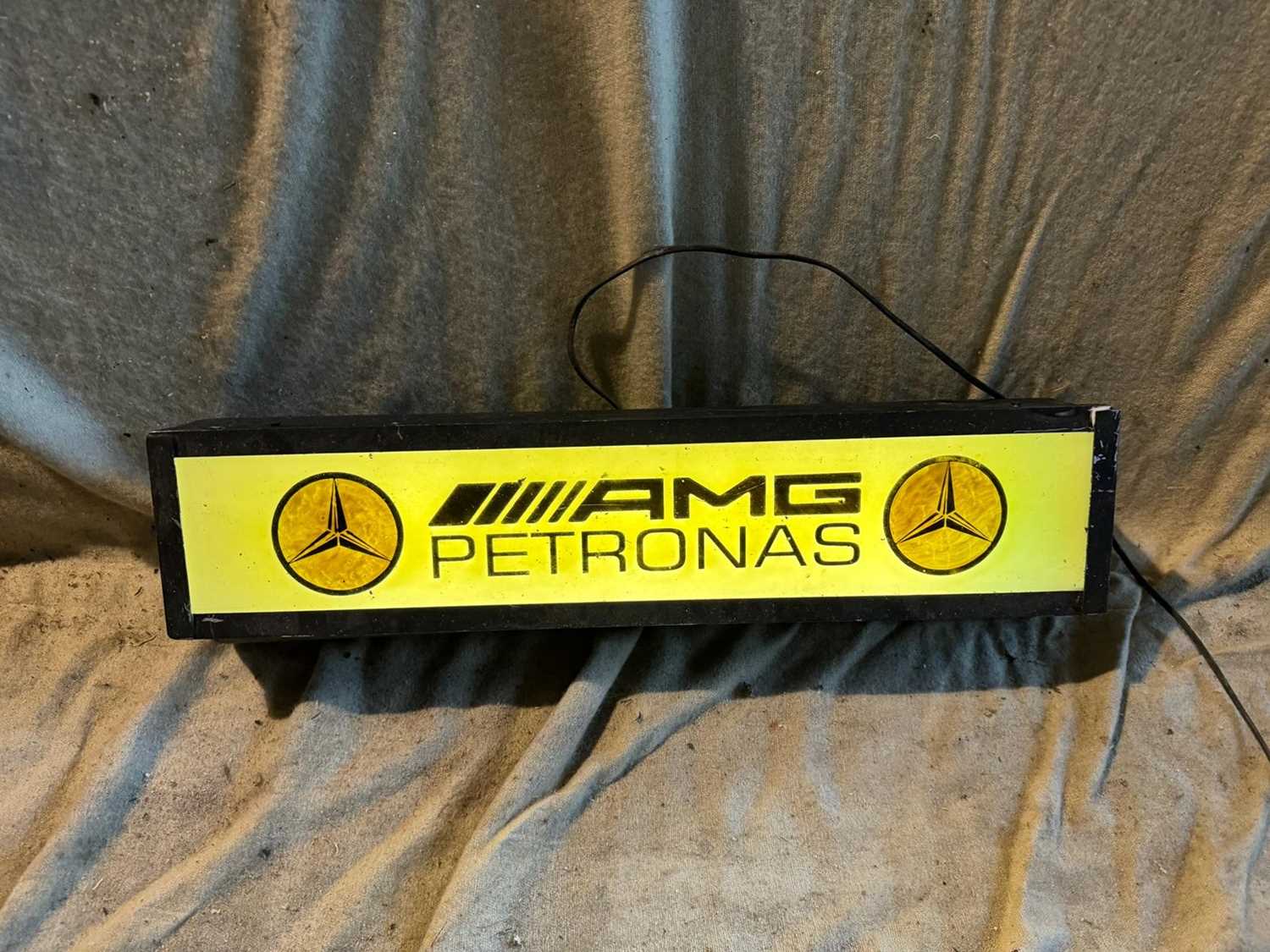 Lot 393 - AMG PETRONAS LIGHT UP SIGN  27" X 6"