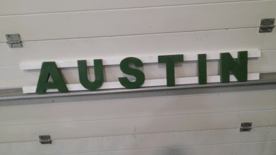Lot 31 - WOODEN HAND PAINTED AUSTIN LETTERS 47" x 6"
