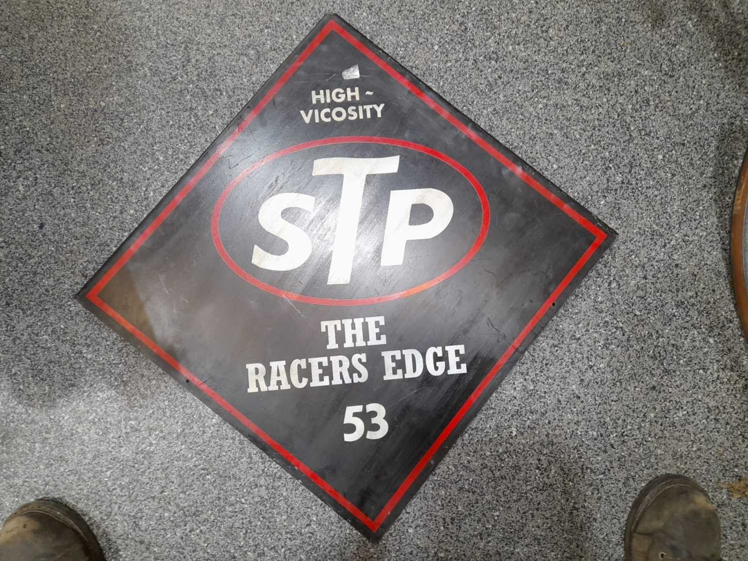 Lot 516 - STP THE RACERS EDGE SIGN 22" X 23"