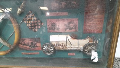 Lot 176 - HISTORY OF CAR RACING MEM IN GLASS CABINET