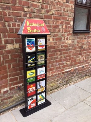 Lot 157 - VINTAGE OIL CAN DISPLAY IN CUSTOM BUILT CABINET