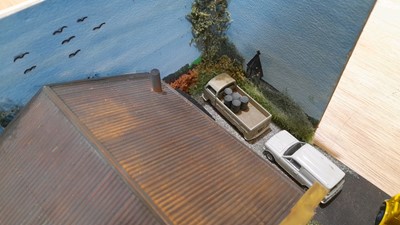 Lot 361 - 1.76 SCALE GARAGE WORKSHOP & SALES PITCH, INC CARS AND WORKING GARAGE LIGHTS
