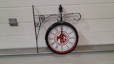 Lot 499 - MG WALL MOUNTED CLOCK , DOUBLE SIDED