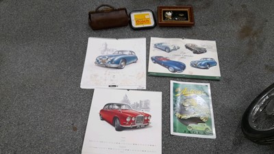 Lot 415 - BOSCH + E TYPE JAGUAR CLOCKS, CALENDARS + 1910 JUCO LEATHER BAG