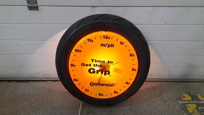 Lot 857 - CONTINENTAL  M/C TYRE LIGHT UP CLOCK