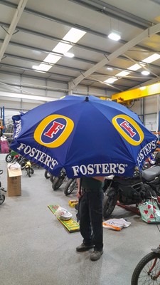 Lot 448 - FOSTERS ADVERTISING PARASOL ( NEVER USED )