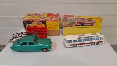 Lot 607 - DINKY SUPER TOYS BOXED, COACH + 1951 MK1 BATTERY POWERED JAGUAR, BY EMPIRE INTERNATIONAL