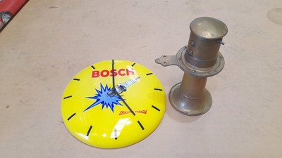 Lot 709 - BRASS KLAXON HORN & PLASTIC BATTERY ,BOSCH PLUG CLOCK