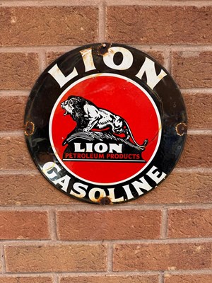 Lot 31 - ENAMEL ROUND LION GASOLINE SIGN