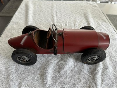 Lot 68 - TIN PLATE RACING CAR  12" X 4"