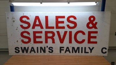 Lot 387 - LARGE PLASTIC SALES & SERVICE SWAIN'S FAMILY SIGN 65" X 29"